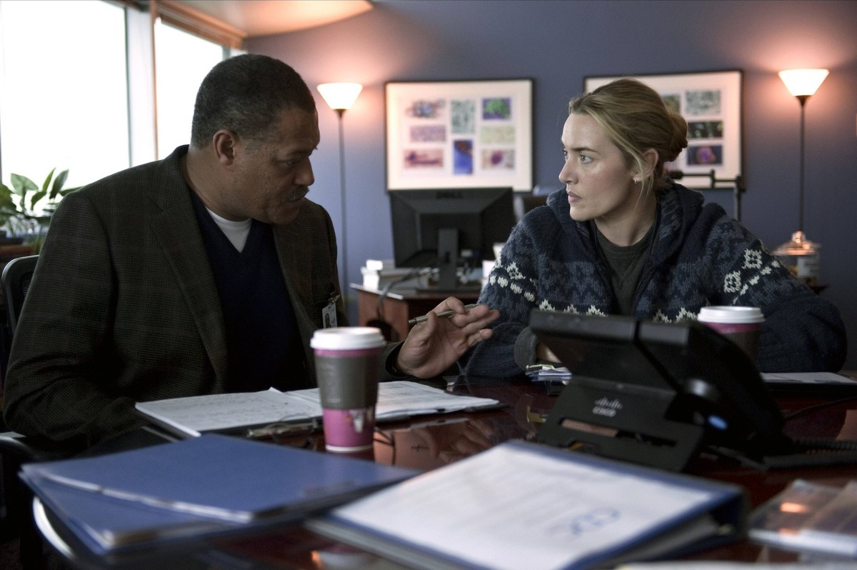 Laurence Fishburne &amp; Kate Winslet Characters: Dr. Ellis Cheever, Dr. Erin Mears Film: Contagion 2011 Director: Steven Soderbergh 08 September 2011 PUBLICATIONxINxGERxSUIxAUTxONLY Copyright: MaryxE ...
