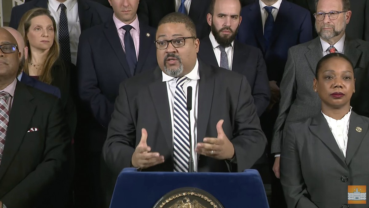 This photo provided by the NYC Office of the Mayor shows Manhattan district attorney Alvin Bragg speaking during a news conference, Monday, Nov. 21, 2022 in New York. Two men who were arrested at New  ...