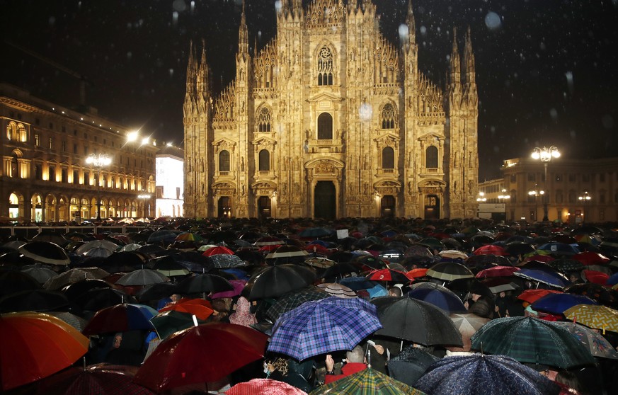 Several thousand demonstrators of the Sardines movement gather to protest against the League&#039;s Matteo Salvini, in front of Milan&#039;s gothic cathedral, Italy, Sunday, Dec. 1, 2019. A grassroots ...