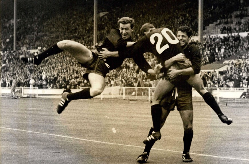 Jul. 13, 1966 - World Cup Football France vs. Mexico at London, Wembley. Photo Shows: Enrique Borja (No. 20) is embraced by teammates after he had scored Mexicos goal against France, during their Worl ...