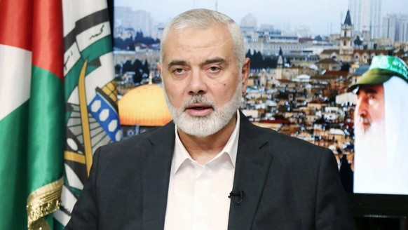 Katar, Hamas-Chef Ismail Haniyya Videoansprache in Doha December 14, 2021, Doha, Doha, Qatar: Head of the Hamas political bureau, Ismail Haniyeh speaks during a video statement marking the 34th annive ...