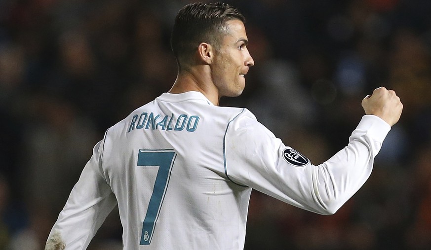 Real Madrid&#039;s Cristiano Ronaldo celebrates after scoring the sixth goal of his team during the Champions League Group H soccer match between APOEL Nicosia and Real Madrid at GSP stadium, in Nicos ...