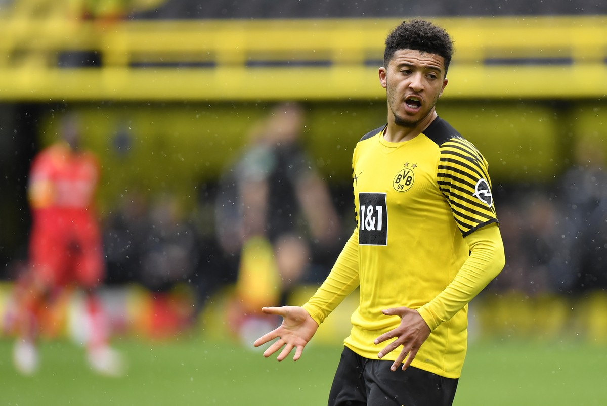 Dortmund's Jadon Sancho reacts after missing a chance to score during the German Bundesliga soccer match between Borussia Dortmund and Bayer Leverkusen in Dortmund, Germany, Saturday, May 22, 202 ...