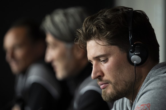 Press officer Adrian Arnold, head coach Murat Yakin and goalkeeper Gregor Kobel of Switzerland, from left, are pictured during a press conference one day prior to the UEFA Nations League Group D leg 1 ...