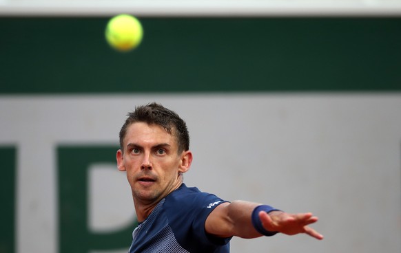 epa09970225 Henri Laaksonen of Switzerland plays Pedro Martinez of Spain in their men?s first round match during the French Open tennis tournament at Roland ?Garros in Paris, France, 23 May 2022. EPA/ ...