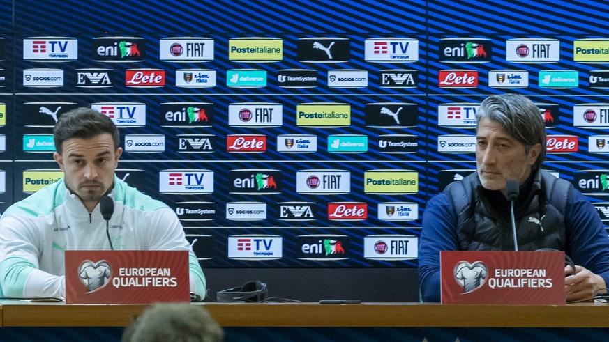 epa09576363 Switzerland&#039;s head coach Murat Yakin (R) and Xherdan Shaqiri (L) attend a press conference in Rome, Italy, 11 November 2021. Switzerland will face Italy in their FIFA World Cup 2022 q ...