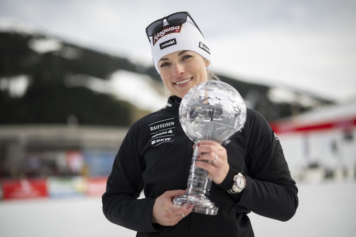 Lara Gut-Behrami of Switzerland poses with the women's giant slalom overall leader crystal globe trophy in the finish area during the second run of the women's giant slalom race at the FIS A ...
