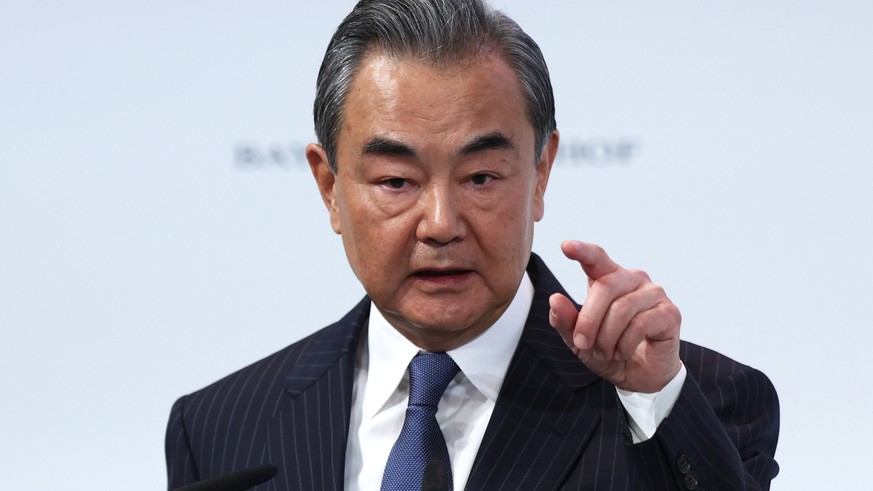 epa10474469 Chinese foreign affairs Minister Wang Yi speaks during the 2023 Munich Security Conference (MSC) in Munich, Germany, 18 February 2023. The Munich Security Conference brings together defenc ...