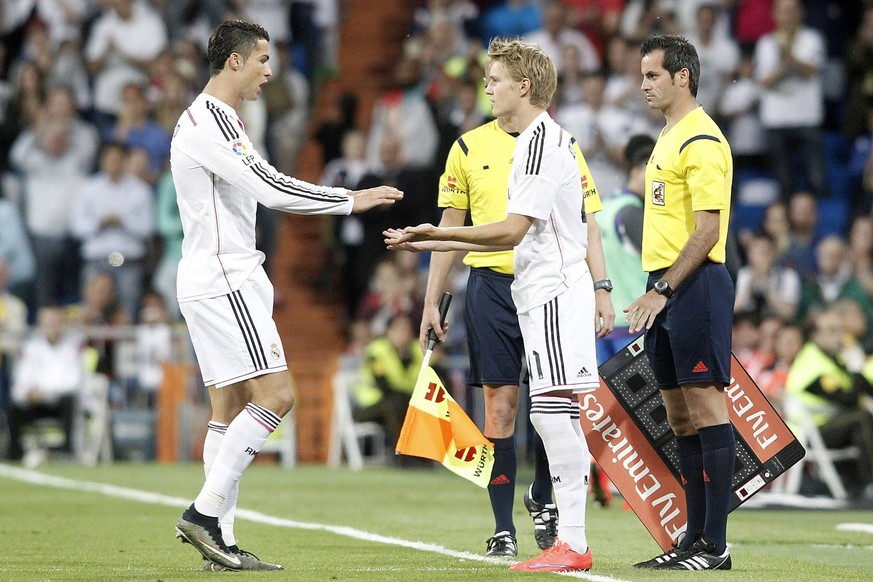 Real Madrid s Martin Odegaard (r) and Cristiano Ronaldo during La Liga match. May 23,2015. PUBLICATIONxINxGERxSUIxAUTxPOLxDENxNORxSWExONLY (2015052363)

Real Madrid s Martin Odegaard r and Cristiano ...