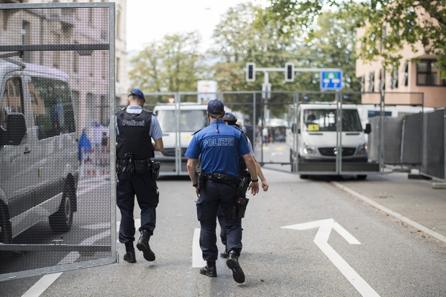 Policemen and police vehicles seen on the occasion of the annual technoparade &quot;StreetParade&quot; in the city center of Zurich, Switzerland, Saturday, 12 August, 2017. (KEYSTONE/Ennio Leanza)