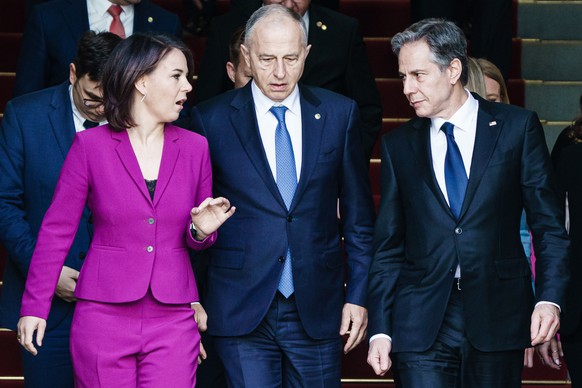 epaselect epa09948262 (L-R) Germany?s Foreign Minister Annalena Baerbock, NATO Deputy Secretary General Mircea Geoana and US Secretary of State Antony Blinken walk next to each other on their way to a ...