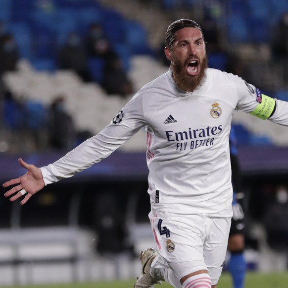 Real Madrid&#039;s Sergio Ramos celebrates after scoring his side&#039;s second goal during the Champions League group B soccer match between Real Madrid and Inter Milan at the Alfredo Di Stefano stad ...