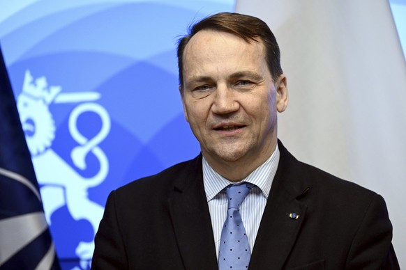Foreign Minister of Poland Radoslaw Sikorski speaks during a joint press conference with Foreign Minister of Finland Elina Valtonen, not pictured, in Helsinki, Finland, Thursday March 14, 2024. (Markk ...