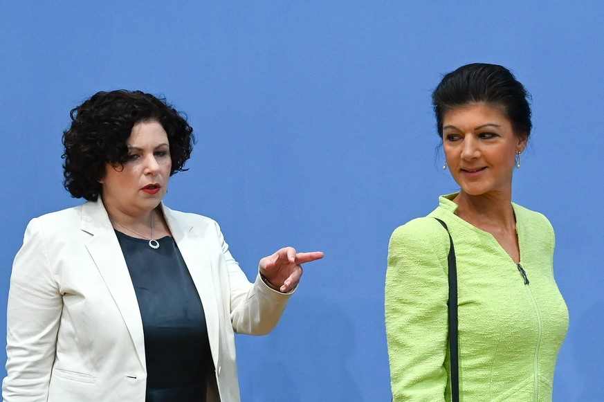 epa10933987 German left-wing politician Sahra Wagenknecht (R), together with the parliamentary co-chair of the left-wing party (Die Linke) Amira Mohamed Ali, presents plans for a new political project called ...