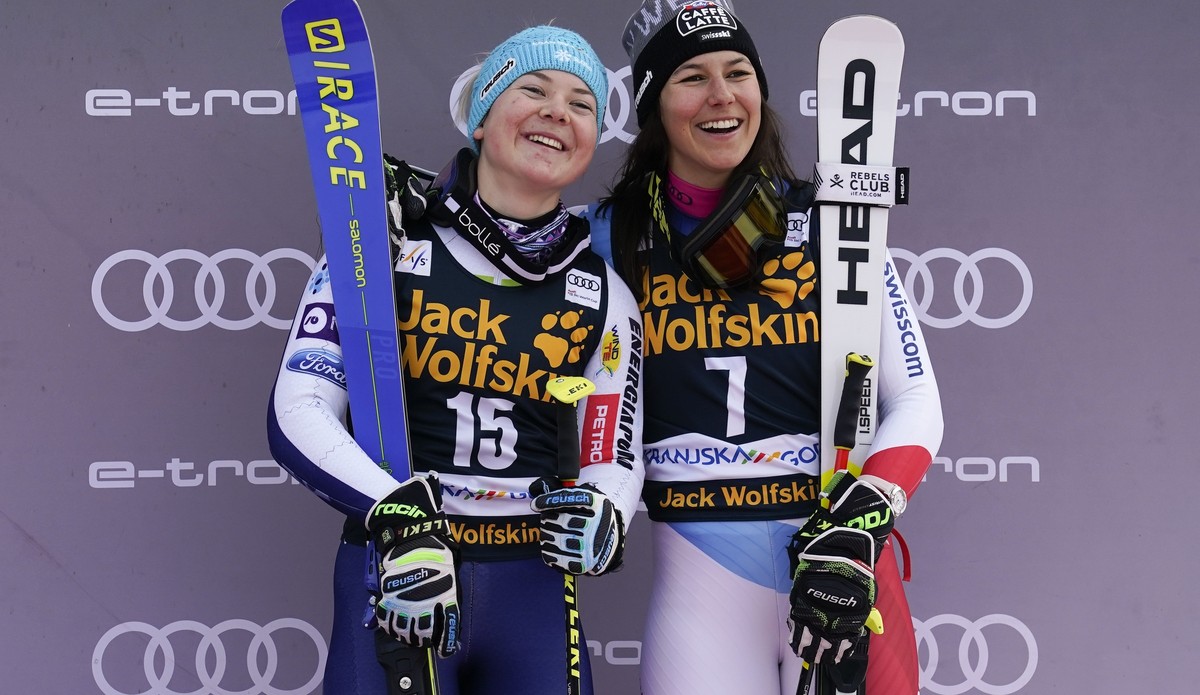 Slovenia's Meta Hrovat, left, and Switzerland's Wendy Holdener celebrate taking third place in an alpine ski, women's World Cup giant slalom, in Kranjska Gora, Slovenia, Saturday, Feb.  ...