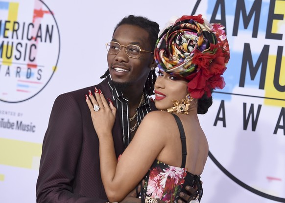 Offset, left, and Cardi B arrive at the American Music Awards on Tuesday, Oct. 9, 2018, at the Microsoft Theater in Los Angeles. (Photo by Jordan Strauss/Invision/AP)