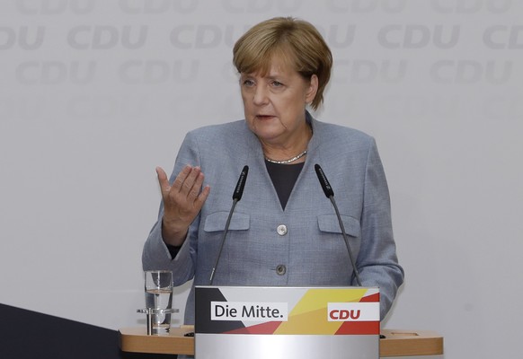 German Chancellor Angela Merkel speaks during a press conference after a board meeting of the Christian Democratic Union CDU in Berlin, Germany, Monday, Sept. 25, 2017, the day after the German parlia ...