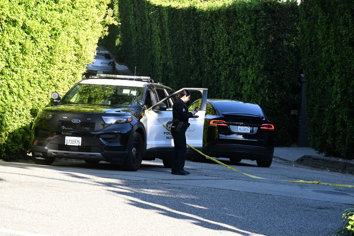 LOS ANGELES, CA - MARCH 08: A police officer is seen outside of Rihanna's Beverly Hills home after a report of gun shots fired on March 08, 2026 in Los Angeles, California. According to reports,  ...