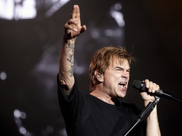 FILE - In this June 3, 2017 file photo singer Campino performs on stage with his band &quot;Die Toten Hosen&quot; at the music festival Rock am Ring in Nuerburg, Germany. Campino one of Germany’s most ...