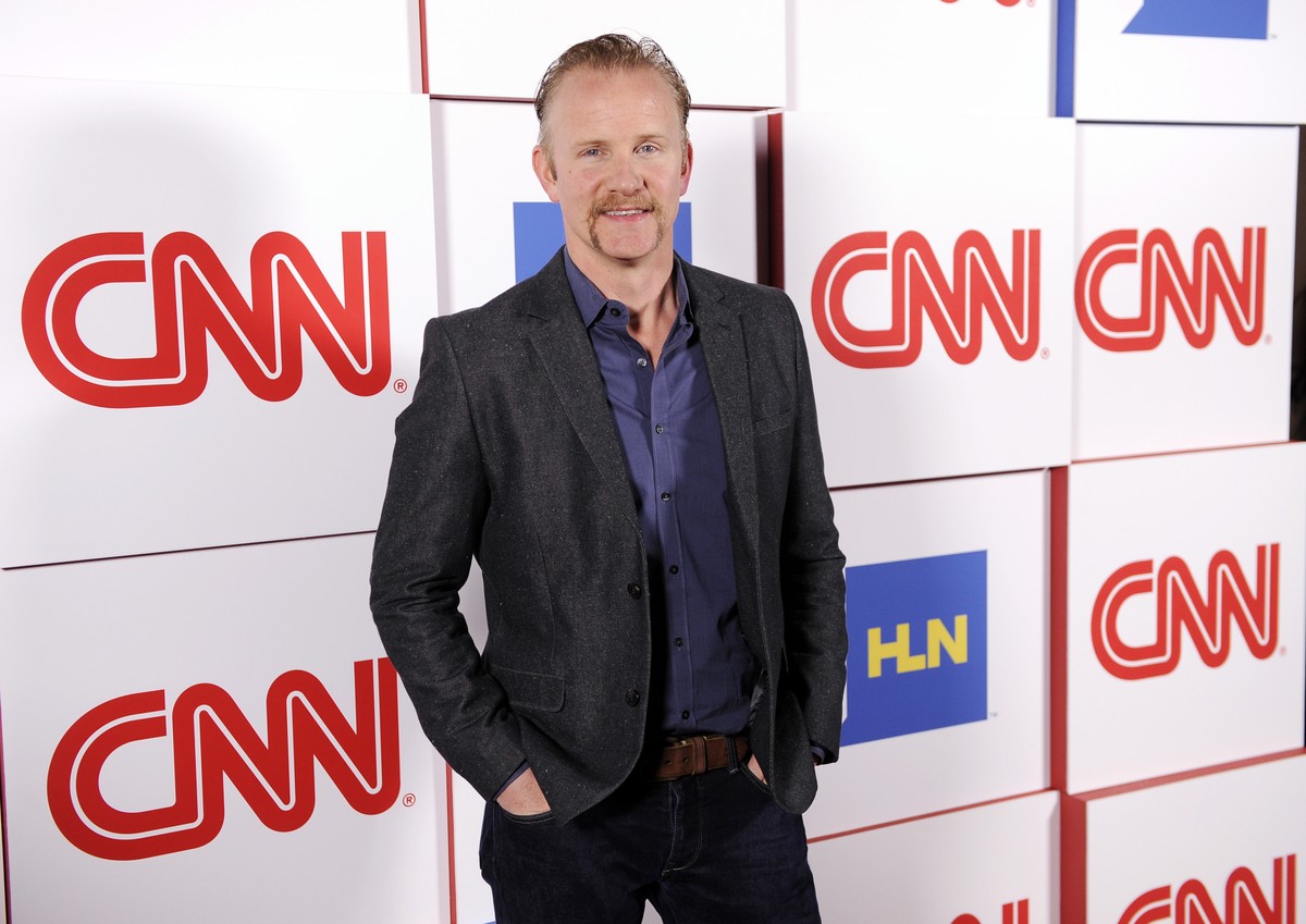 FILE - Morgan Spurlock of the CNN series "Inside Man" poses at the CNN Worldwide All-Star Party, on Friday, Jan. 10, 2014, in Pasadena, Calif. Spurlock, an Oscar-nominee who made food and Am ...
