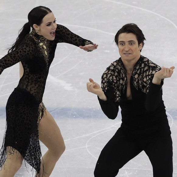 Tessa Virtue and Scott Moir of Canada perform during the ice dance, short dance figure skating in the Gangneung Ice Arena at the 2018 Winter Olympics in Gangneung, South Korea, Monday, Feb. 19, 2018.  ...