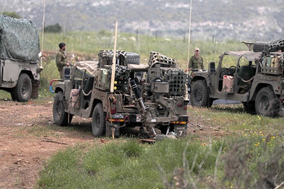 epa10563108 Israeli special unit soldiers taking positions overlooking the Israel -Lebanon border next to Malkia settlement north of Israel, 07 April 2023. Israeli military launched airstrikes in the  ...