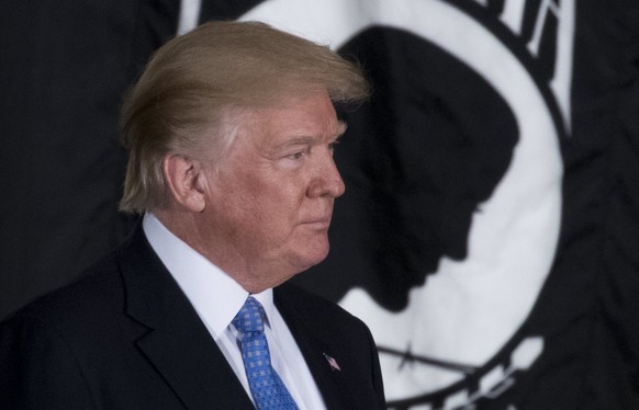 epa06448023 US President Donald J. Trump participates in a Congressional Gold Medal Ceremony in honor of former Senate Majority Leader Bob Dole in the Rotunda of the US Capitol in Washington, DC, USA, ...