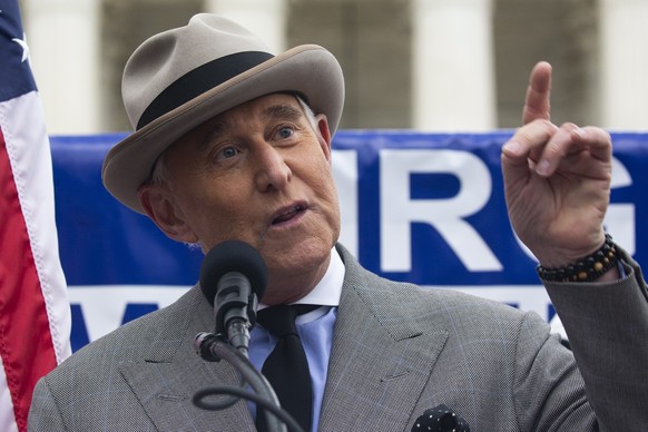 epa08921134 Roger Stone speaks to an audience of Trump supporters at a rally outside the US Supreme Court in Washington, DC, USA, 05 January 2021. Right-wing conservative groups have begun to protest  ...