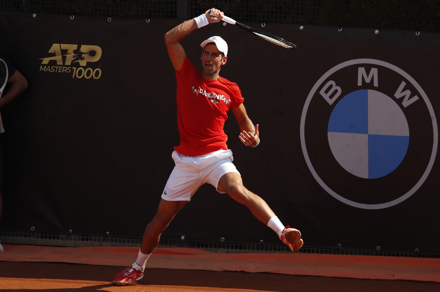 epa08668322 Novak Djokovic of Serbia in action during a training session at the Italian Open tennis tournament in Rome, Italy, 14 September 2020. EPA/Clive Brunskill / POOL