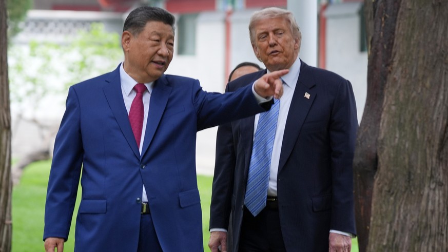 FILE - President Donald Trump talks with China's President Xi Jinping at the Zhongnanhai leadership compound, May 15, 2026, in Beijing. (AP Photo/Mark Schiefelbein, Pool, File)
China American Wro ...
