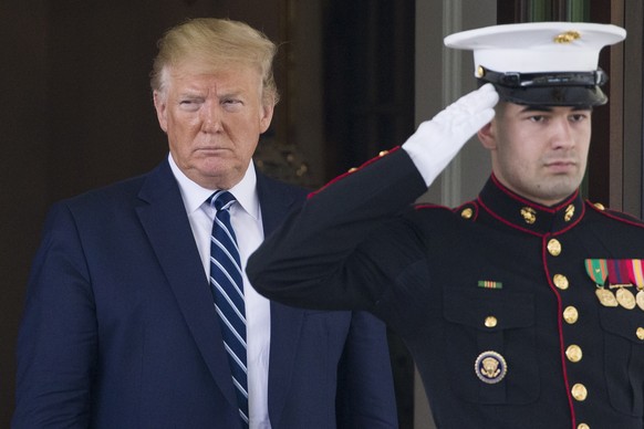 President Donald Trump watches as Canadian Prime Minister Justin Trudeau departs the White House, Thursday, June 20, 2019, in Washington. (AP Photo/Alex Brandon)