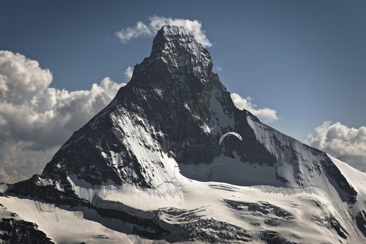 HANDOUT - Christian Maurer of Switzerland (SUI1) performs during the fifth day of the Red Bull X-Alps 2013 at the Matterhorn in Switzerland. At the sixth edition of the world's toughest adventure ...