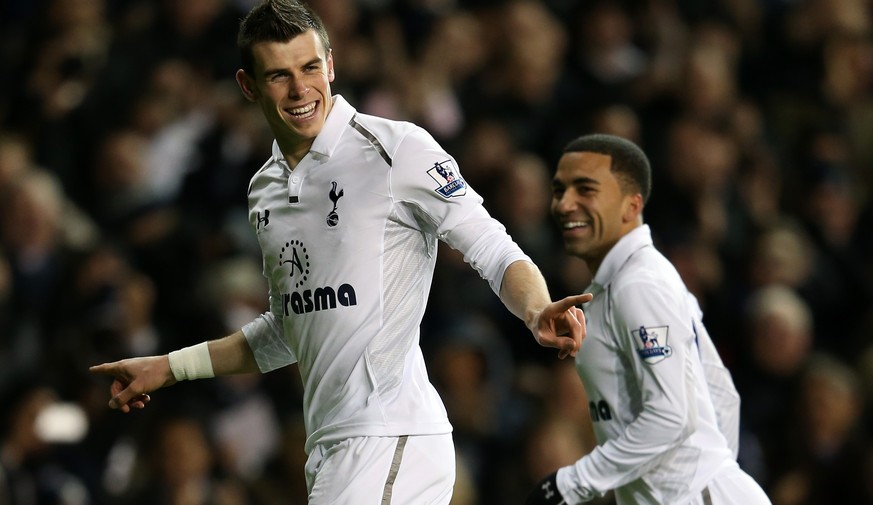 LONDON, ENGLAND - NOVEMBER 28: Gareth Bale of Tottenham Hotspur celebrates scoring their second goal from a free kick during the Barclays Premier League match between Tottenham Hotspur and Liverpool a ...