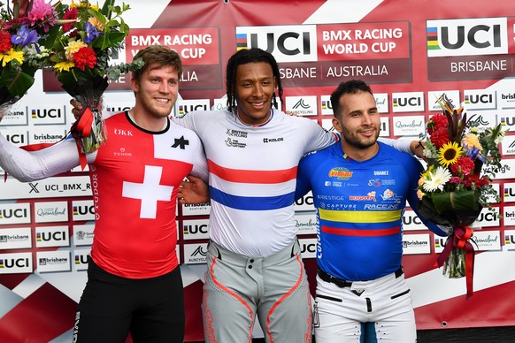 epa11179972 (L-R) Second-placed Cedric Butti of Switzerland, first-placed Kye Whyte of Britain, and third placed Carlos Ramirez of Colombia pose for a photo after the final of the Men Elite event duri ...