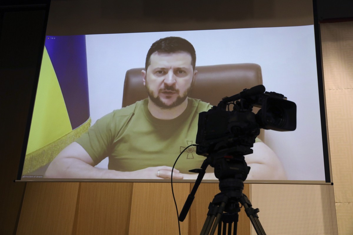 Ukrainian President Volodymyr Zelenskyy addresses members of the South Korea Parliament via video link at the National assembly on Monday, April 11, 2022 in Seoul, South Korea. Zelenskyy called for So ...