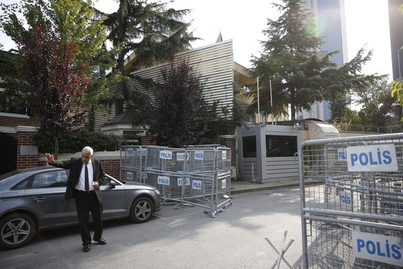 A security guard stands on a blocked road, leading to the Saudi Arabia consulate, background, in Istanbul, Wednesday, Oct. 3, 2018. A Saudi journalist who has written Washington Post columns critical  ...