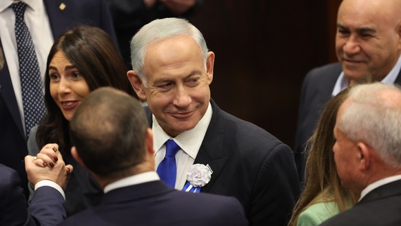 Israel&#039;s Likud Party leader Benjamin Netanyahu arrives during the swearing-in ceremony for Israeli lawmakers at the Knesset, Israel&#039;s parliament, in Jerusalem, Tuesday, Nov. 15, 2022. Israel ...