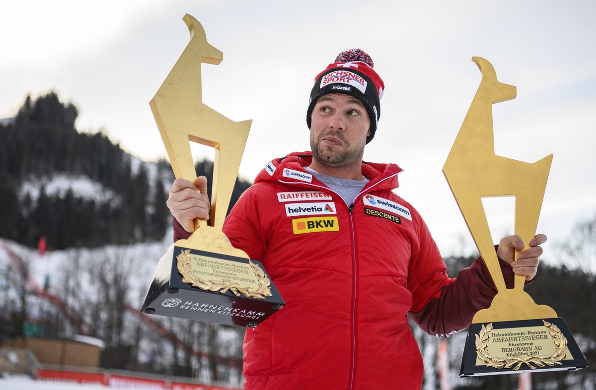 epaselect epa08962491 Beat Feuz of Switzerland poses for photographs with his Gams trophies after winning the two men's Downhill races of the FIS Alpine Skiing World Cup event in Kitzbuehel, Aust ...