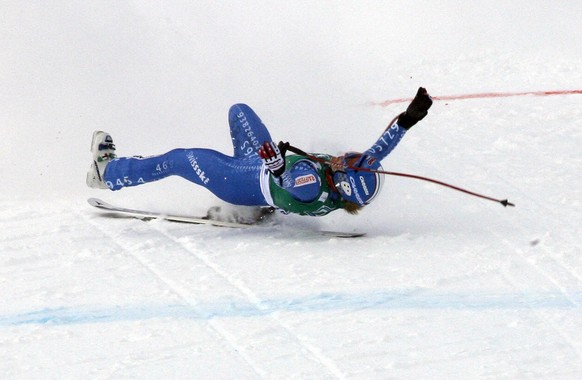 Lara Gut, of Switzerland falls as she crosses the finish line of an alpine ski, women&#039;s World Cup Downhill race, in St. Moritz, Switzerland, Saturday, Feb. 2, 2008. Gut finished in third place. ( ...