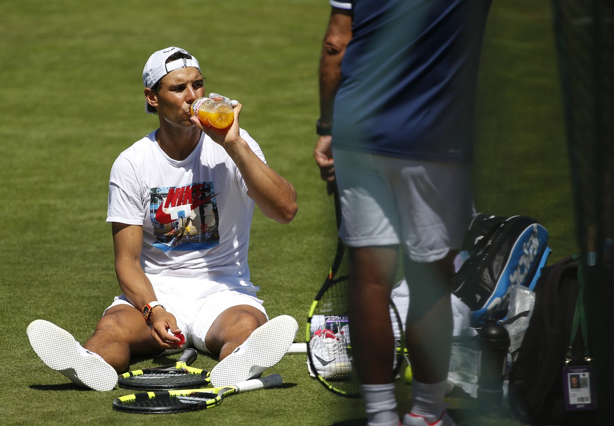 Spain's Rafael Nadal takes a break during a practice session ahead of the Wimbledon Tennis Championships in London, Sunday, July 2, 2017. (AP Photo/Alastair Grant)