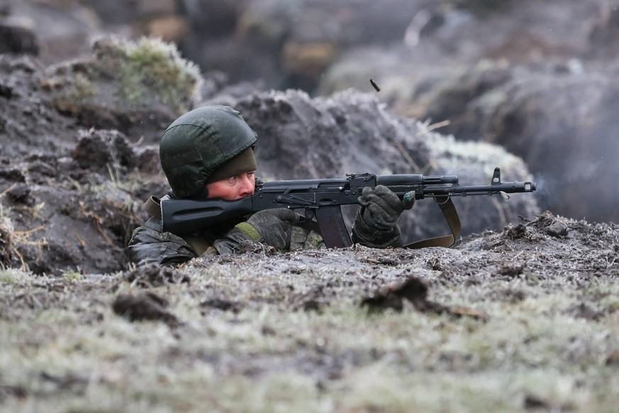 Russia: Team training for Russian personnel in Donetsk Peoples Republic RUSSIA, DONETSK PEOPLE S REPUBLIC - DECEMBER 11, 2023: A serviceman fires his rifle as team training takes place for combat unit ...