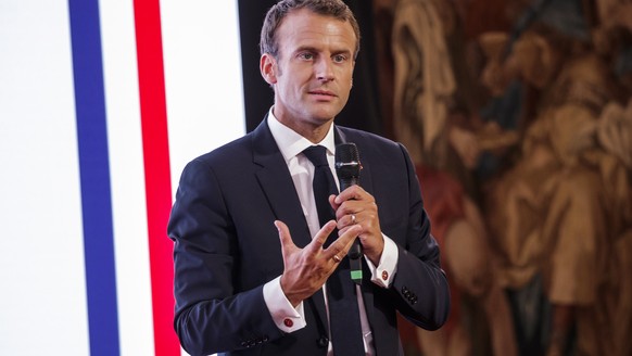 epa06776101 French President Emmanuel Macron delivers a speech at a conference to present a plan for the preservation of heritages sites at the Elysee palace, in Paris, France, 31 May 2018. EPA/CHRIST ...