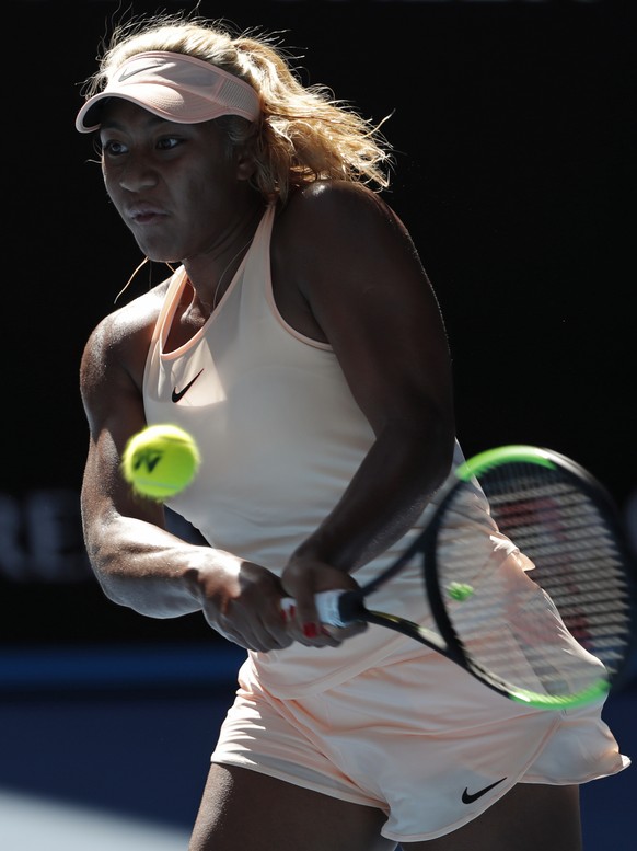 Australia&#039;s Destanee Aiava makes a backhand return to Romania&#039;s Simona Halep during their first round match at the Australian Open tennis championships in Melbourne, Australia, Tuesday, Jan. ...