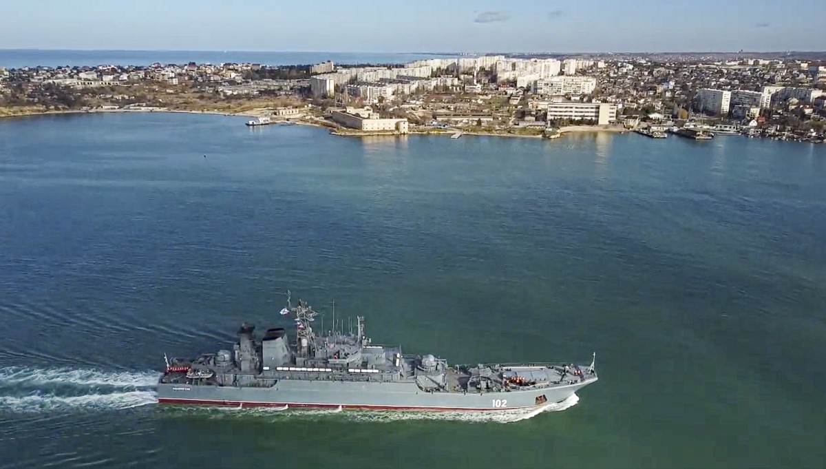 In this handout photo released by Russian Defense Ministry Press Service on Thursday, Feb. 10, 2022, The Russian navy's amphibious assault ship Kaliningrad sails into the Sevastopol harbor in Cri ...