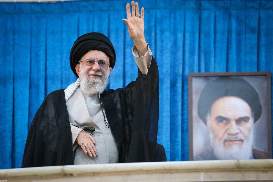 epa12154416 A handout picture made available by Iran&#039;s Supreme Leader Office shows Iranian supreme leader Ayatollah Ali Khamenei waving during a ceremony on the occasion of the 36th death anniver ...
