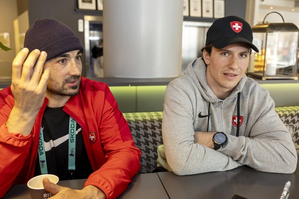 Switzerland&#039;s forward Andres Ambuehl, left, and Switzerland&#039;s forward Nicolas Baechler, right, speak to the journalist, during the media opportunity of the Switzerland National Ice Hockey Te ...