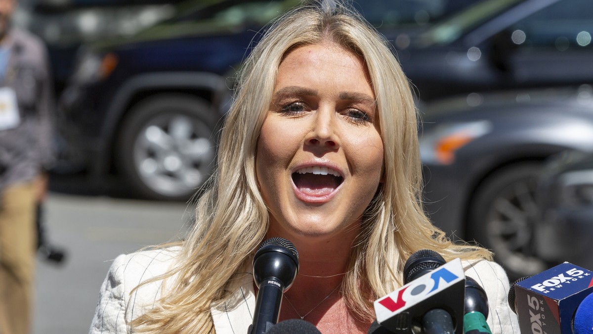 FILE - Karoline Leavitt speaks to the news media across the street from Republican presidential nominee former President Donald Trump's criminal trial in New York, May 28, 2024. (AP Photo/Ted Sha ...
