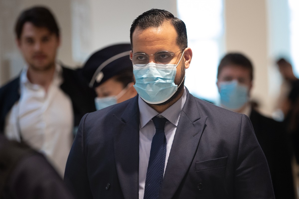 epa09469476 Former French President's security officer, Alexandre Benalla arrives for trial at Paris courthouse, 15 September 2021. President Emmanuel Macron's former bodyguard goes on trial ...
