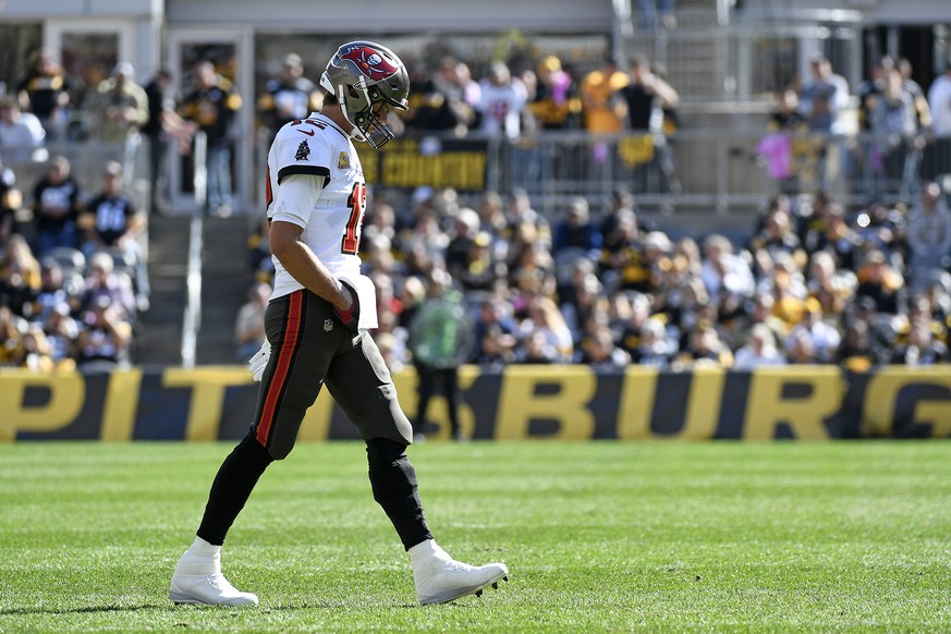 Tampa Bay Buccaneers quarterback Tom Brady walks onto the field during the first half of an NFL football game against the Pittsburgh Steelers in Pittsburgh, Sunday, Oct. 16, 2022. (AP Photo/Don Wright ...