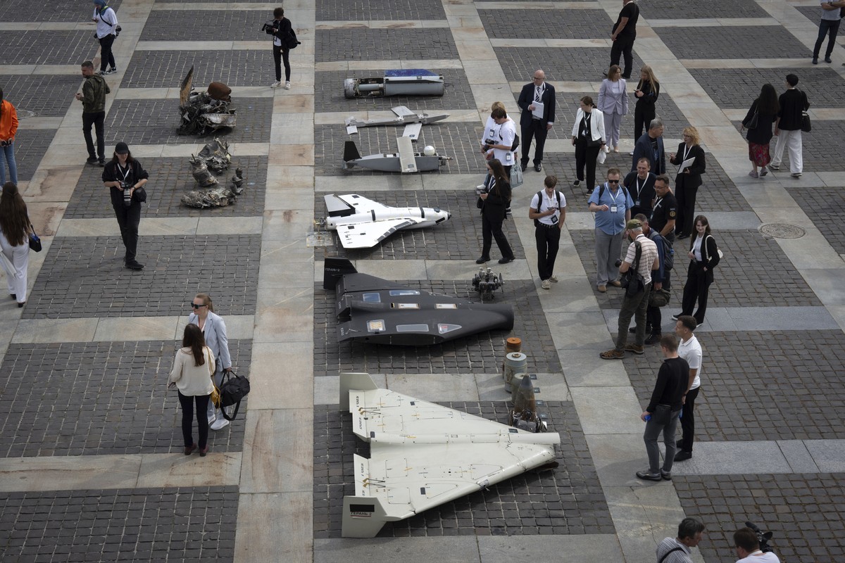 Visitors watch damaged Russian drones during the International Conference on Expanding Sanctions Against Russia in Kyiv, Ukraine, Friday, June 27, 2025. (AP Photo/Efrem Lukatsky)
Russia Ukraine War